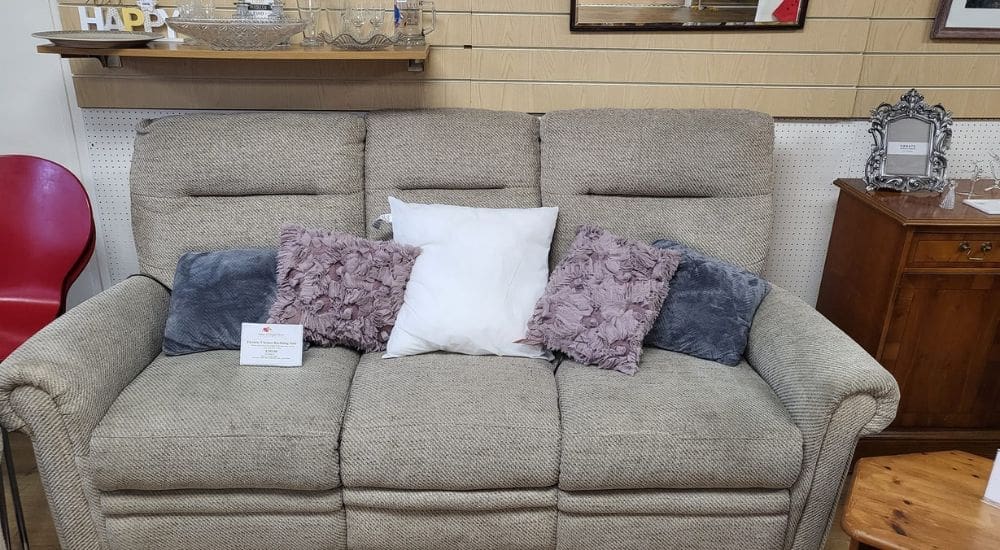 Carterton shop interior grey sofa with cushions