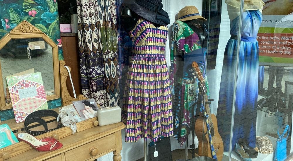 Summertown shop window display with dresses