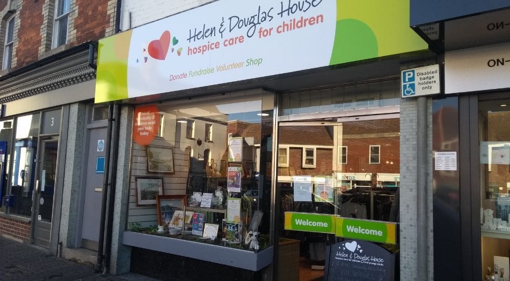 Wantage shop window with Helen & Douglas House logo