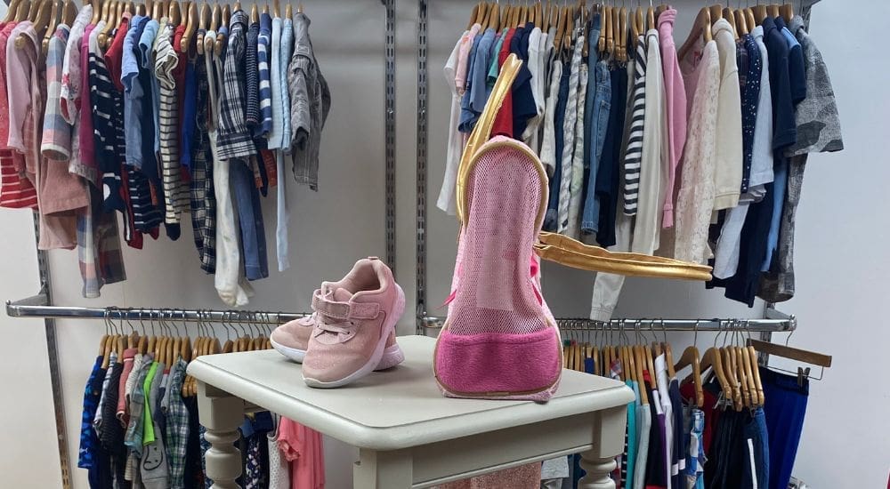 Shop shelf with pink shoes
