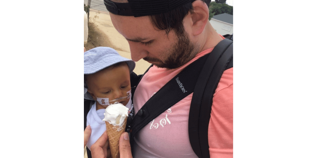 Roman enjoying his first ice cream with dad Oli