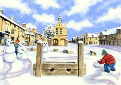 Moreton in Marsh, a winter view of Moreton marketplace in Gloucestershire – Helen & Douglas House Charity Christmas cards